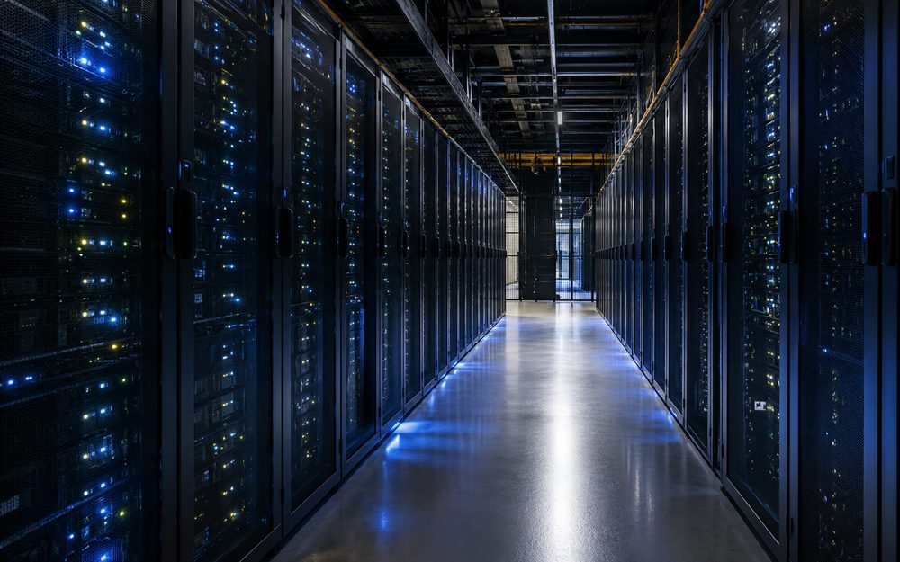 Illuminated server racks in a colocation data hall